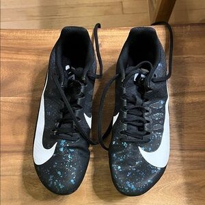 Nike Black and Teal Speckled track and field sneakers